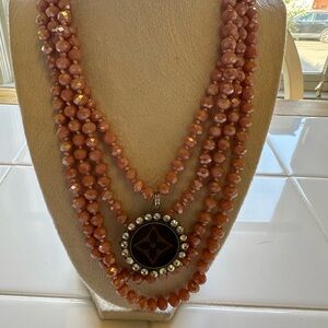 Upcycled 4 strand Elegant peach colored Beaded Necklace with Pendant